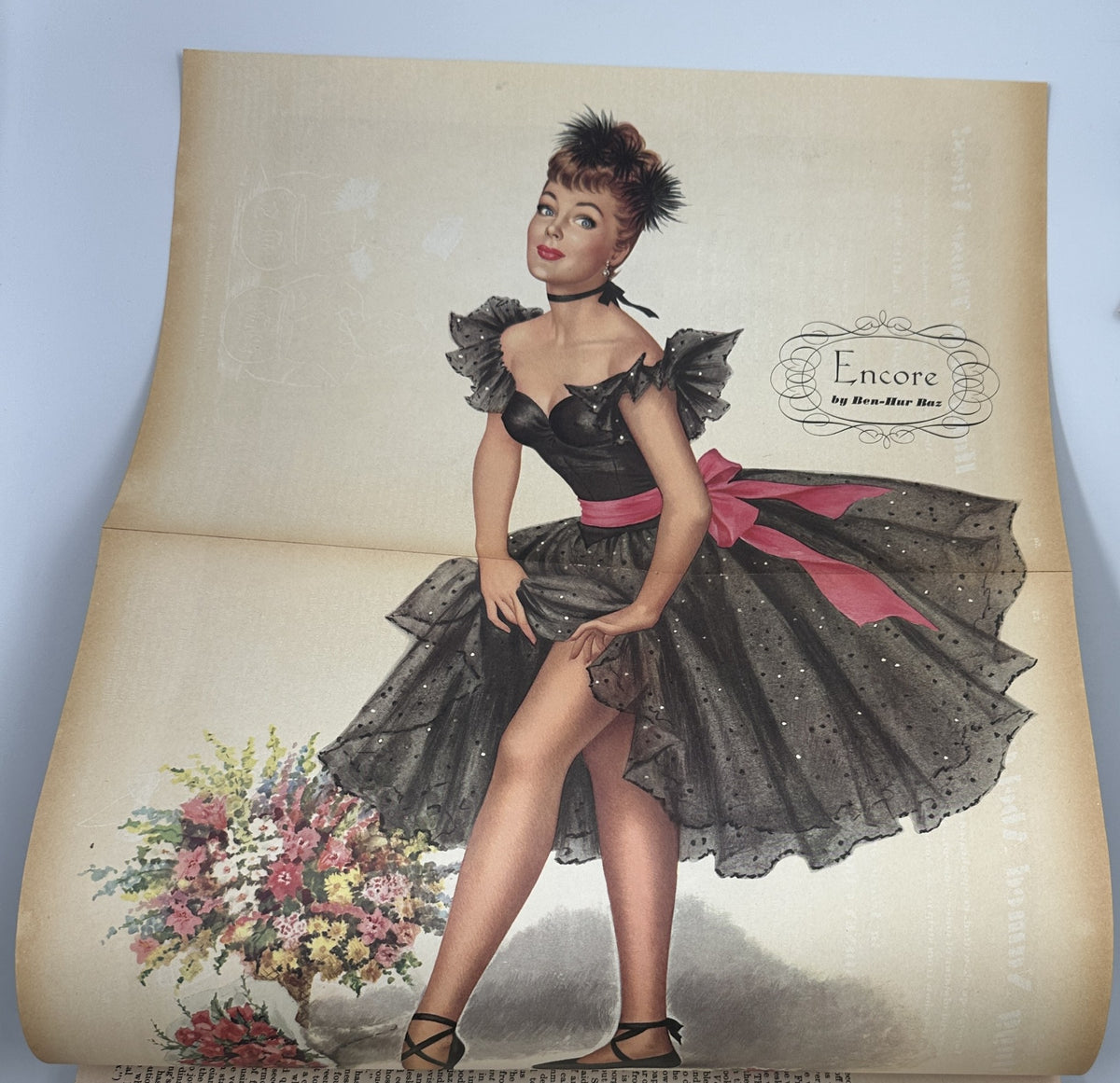 Ben-Hur Baz foldout illustration from Esquire Magazine April 1948 showcasing a stylish pinup girl in a black dress with a pink ribbon and flowers.