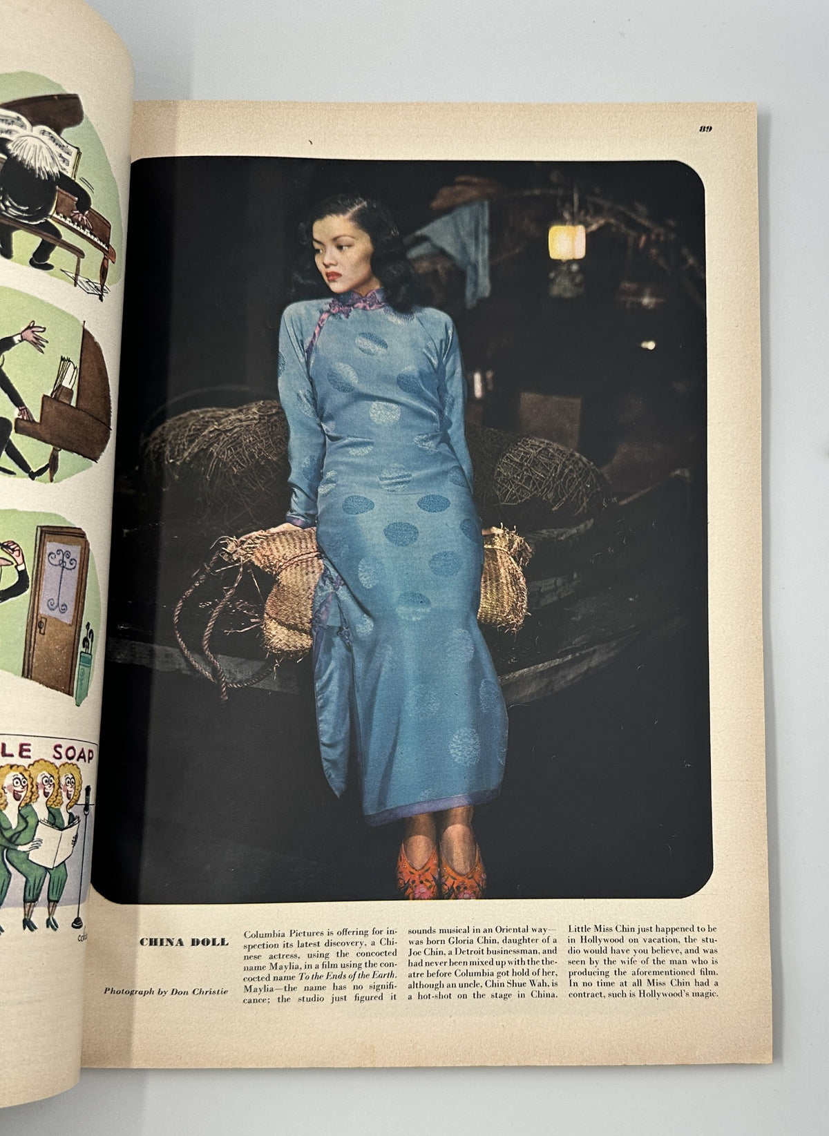 Photography of a woman in a blue dress titled 'China Doll' featured in Esquire Magazine April 1948, highlighting vintage fashion photography.