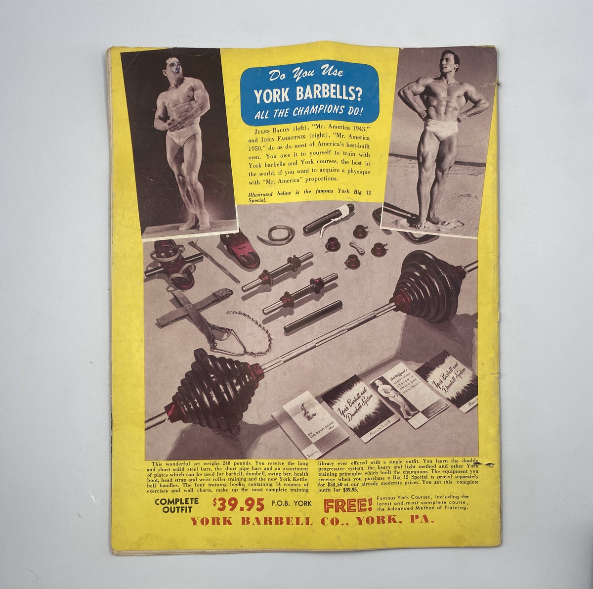 Strength and Health Magazine October 1952 back cover promoting York Barbells with a vibrant layout showcasing fitness equipment and images of bodybuilders.