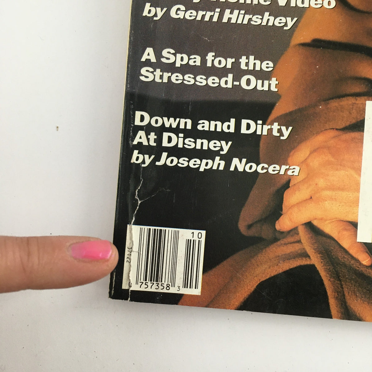 Back cover of GQ Magazine October 1991, featuring articles such as 'A Spa for the Stressed-Out' and 'Down and Dirty At Disney' alongside a barcode.