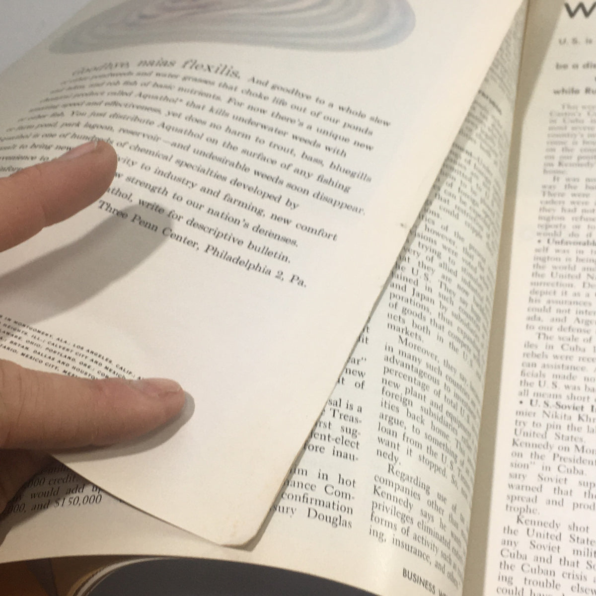 Interior pages of Business Week Magazine from April 22, 1961, showcasing article text and a visual, highlighting insights into the Two World's Fairs.