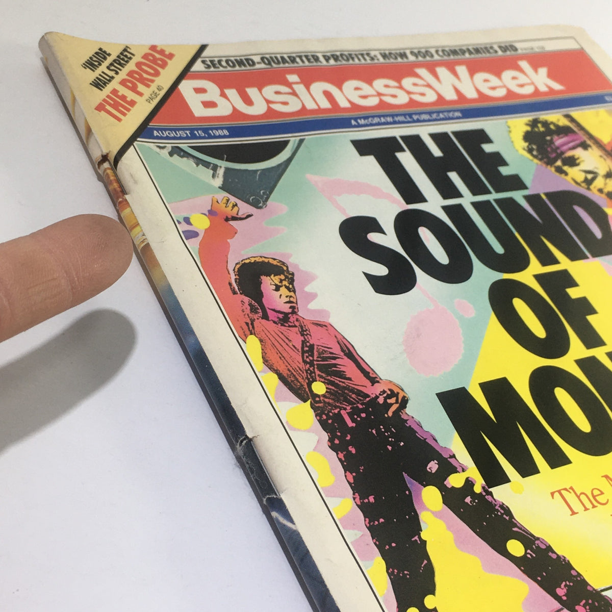 Close-up view of the Business Week Magazine's cover titled 'The Sound of Money: The Music Business Booms Again', emphasizing the article's highlights and artistic design, dated August 15, 1988.