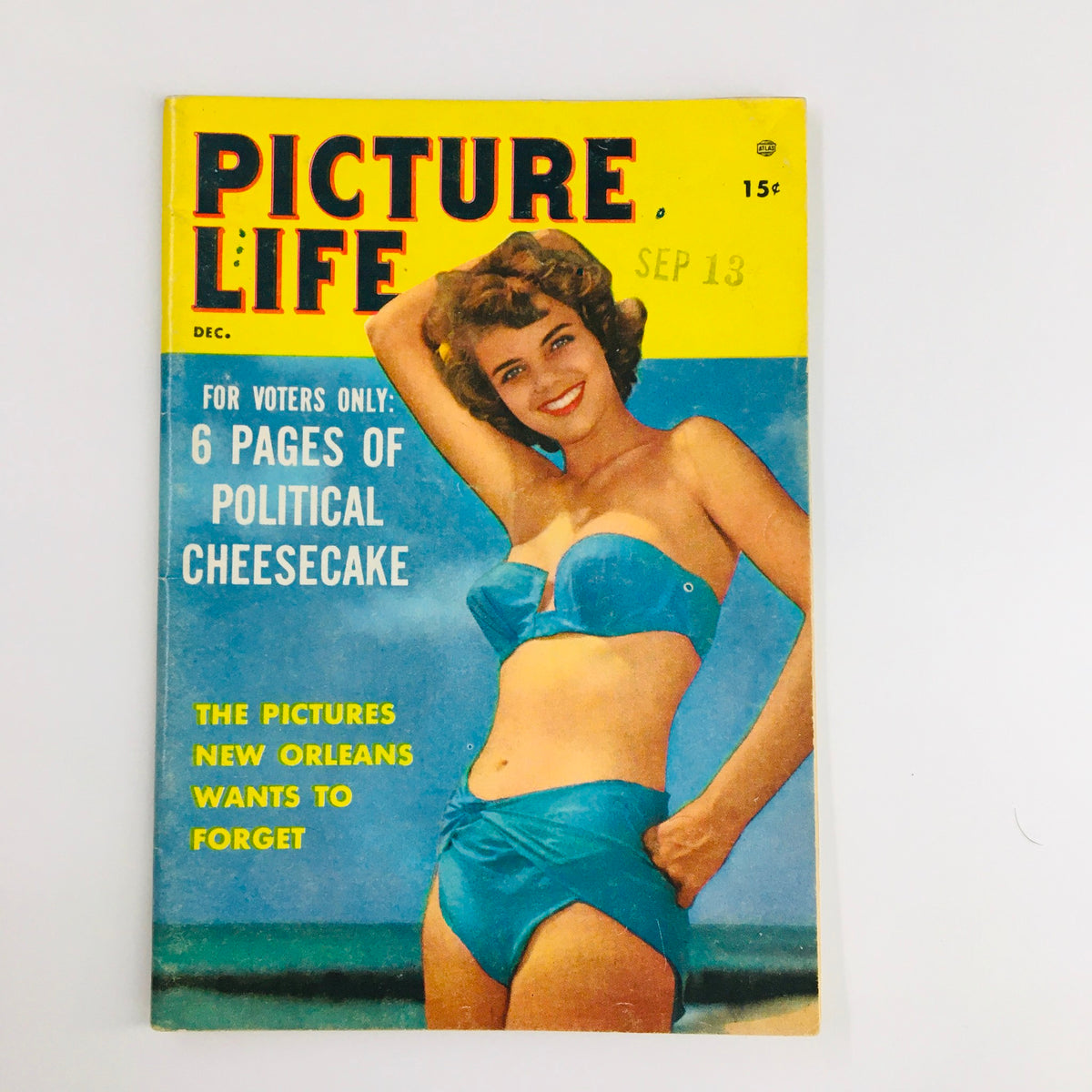 Cover of VTG Picture Life Magazine December 1955 showcasing a woman in a blue bikini on a beach, highlighting the theme 'Ike's Favorite Rascal.'