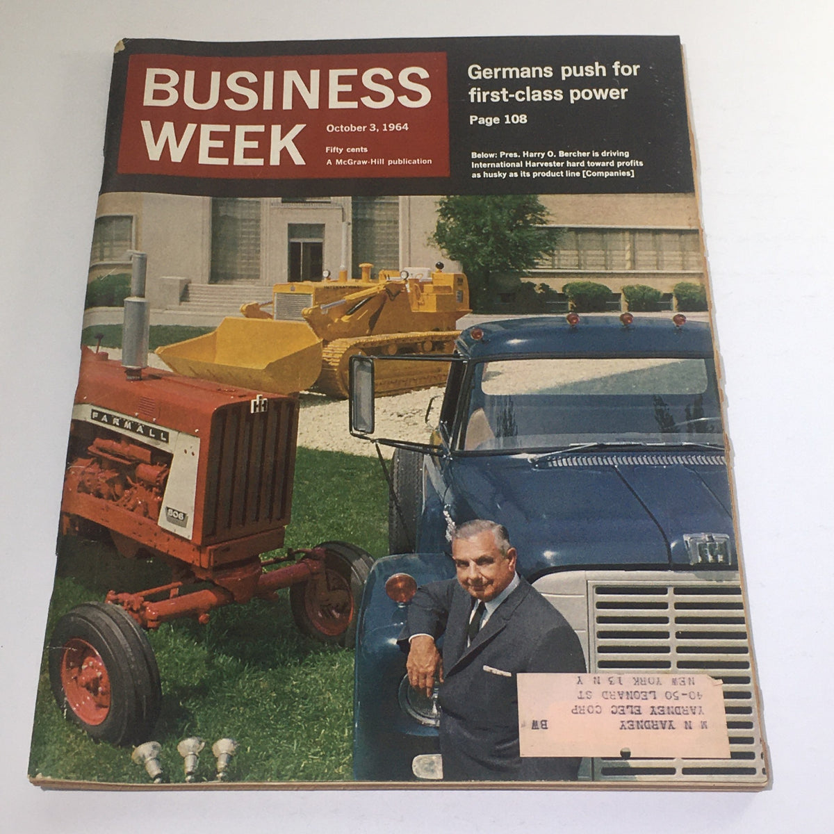 Business Week Magazine cover from October 3, 1964, showcasing President Harry O. Bercher driving a truck with vintage agricultural machinery in the background. This edition highlights business insights and economic trends of the 1960s.