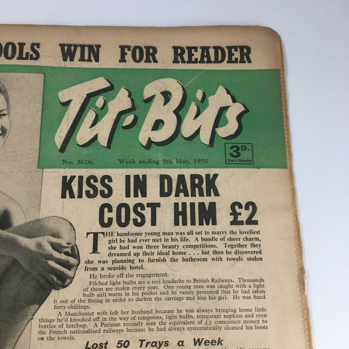 Close-up view of the front cover of VTG Tit-Bits Magazine from May 7, 1955 featuring Mitzi Gaynor, displaying the headline 'Kiss in Dark Cost Him £2' along with iconic 1950s magazine graphics.