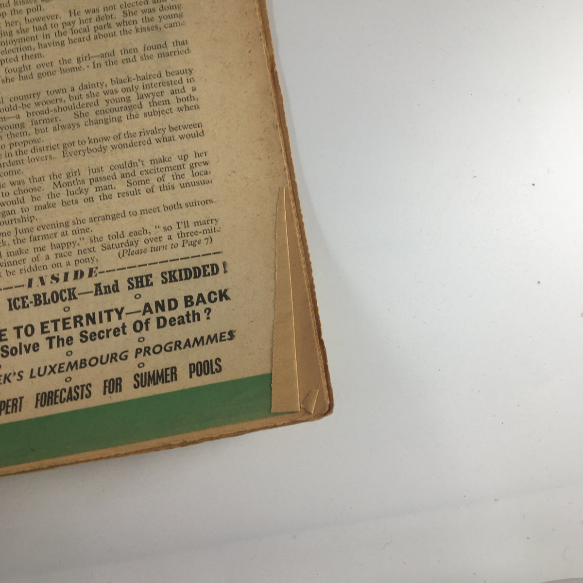 Details of the VTG Tit-Bits Magazine - July 6, 1957 showing the edge of the magazine cover with advertisements and articles, reflecting the historical significance of the era.