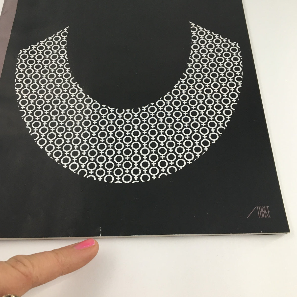 Detailed view of the October 5, 2020 cover of The New Yorker magazine, highlighting a small crease at the bottom corner, with the theme 'Icons' by Bob Staake.