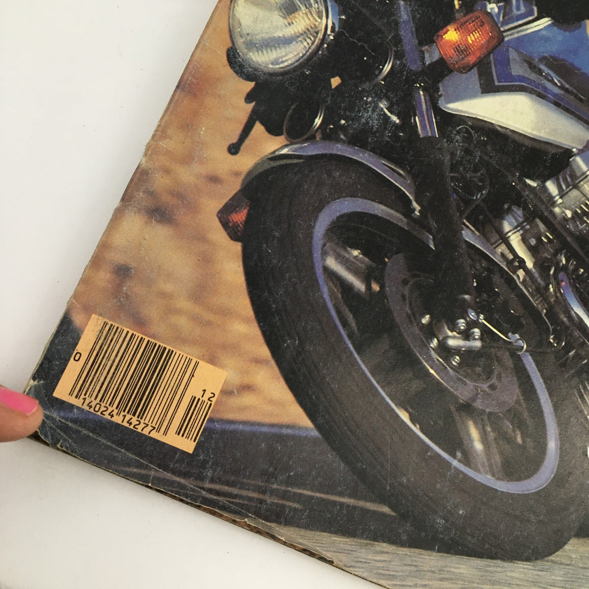 Close-up of the back cover of Cycle Magazine December 1980, highlighting the barcode. This vintage magazine features reviews on Honda CB750F, Suzuki GS1100EX, and BMW R80G/S Boxer.