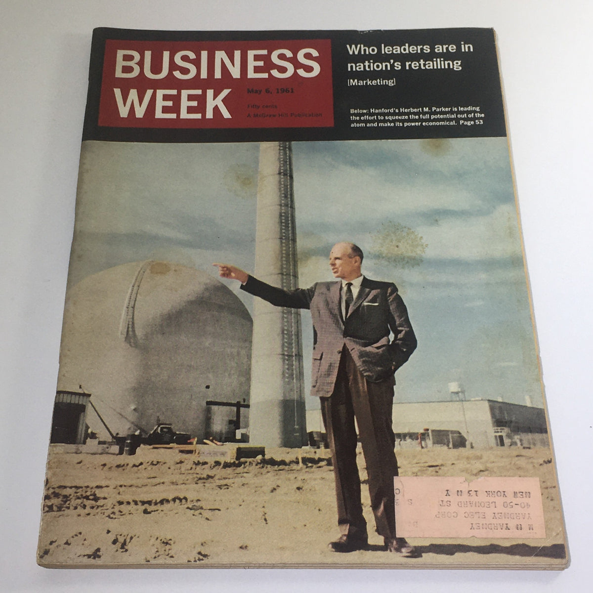 Cover of Business Week Magazine from May 6, 1961, featuring a profile on Hanford's Herbert M. Parker with a backdrop of industrial structures.