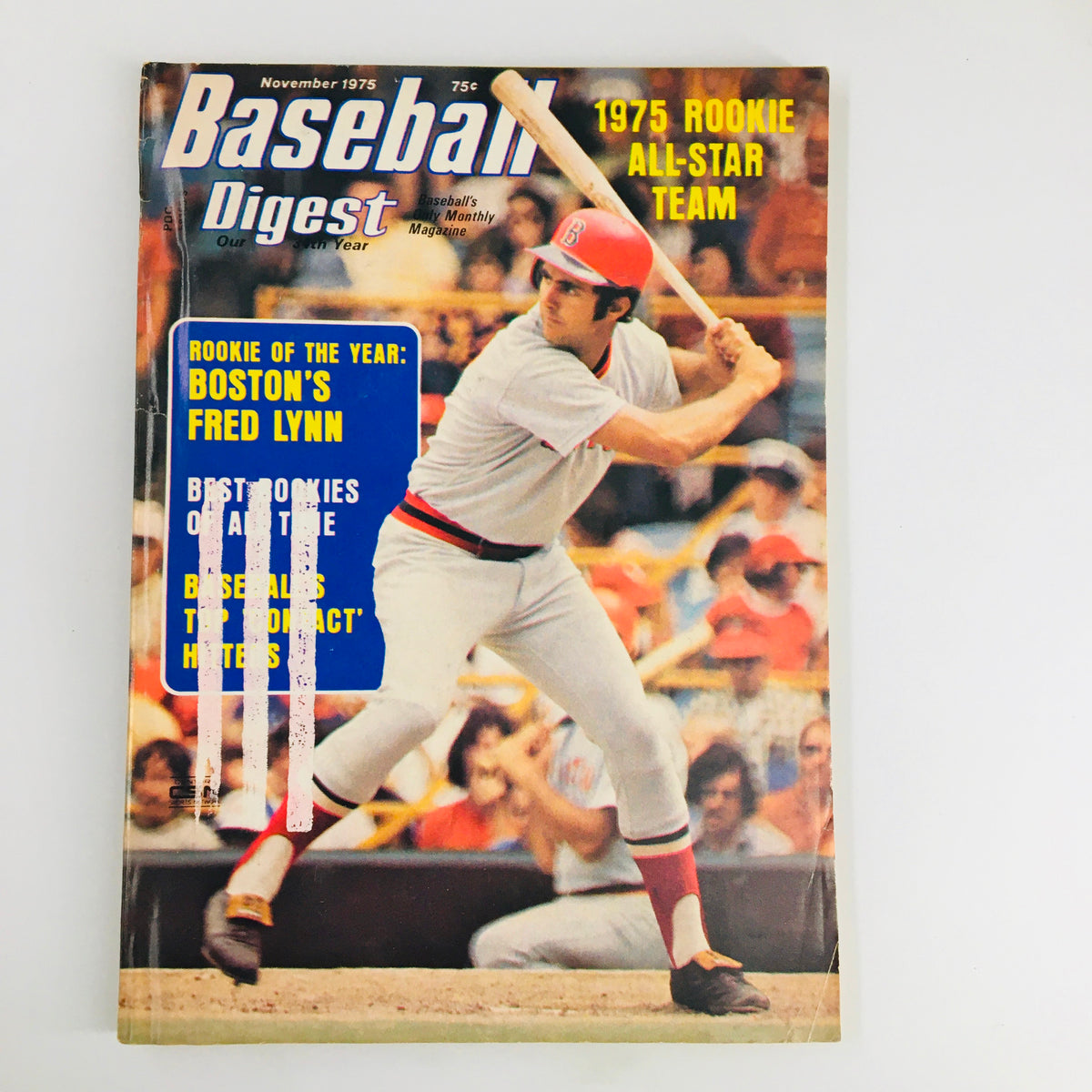 Cover of the November 1975 Baseball Digest magazine featuring Boston's Fred Lynn as Rookie of the Year, highlighting articles on baseball strategies and player performances.