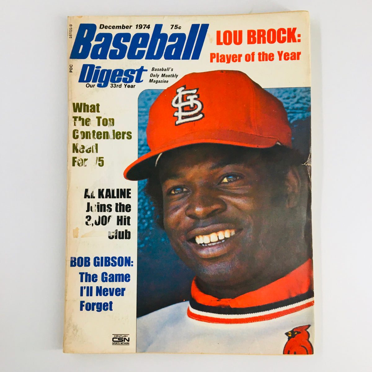 Vintage Baseball Digest Magazine from December 1974 featuring Bob Gibson on the cover, showcasing the title 'The Game I'll Never Forget' and highlighting Lou Brock as Player of the Year.