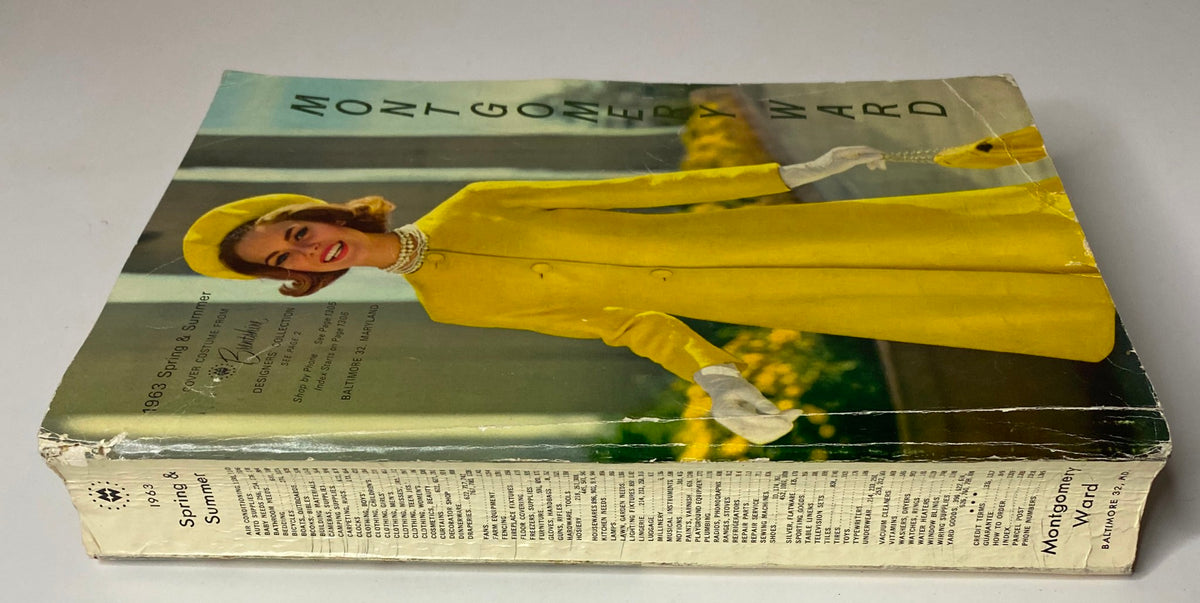 Side view of the 1963 Montgomery Ward Spring and Summer Catalog highlighting the vintage design and yellow front cover.