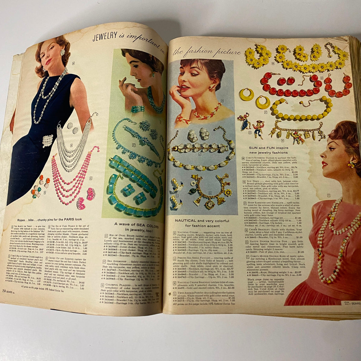 1958 Sears, Roebuck and Co. Spring and Summer Catalog page displaying vintage jewelry featuring colorful necklaces and accessories, highlighting mid-century fashion trends.