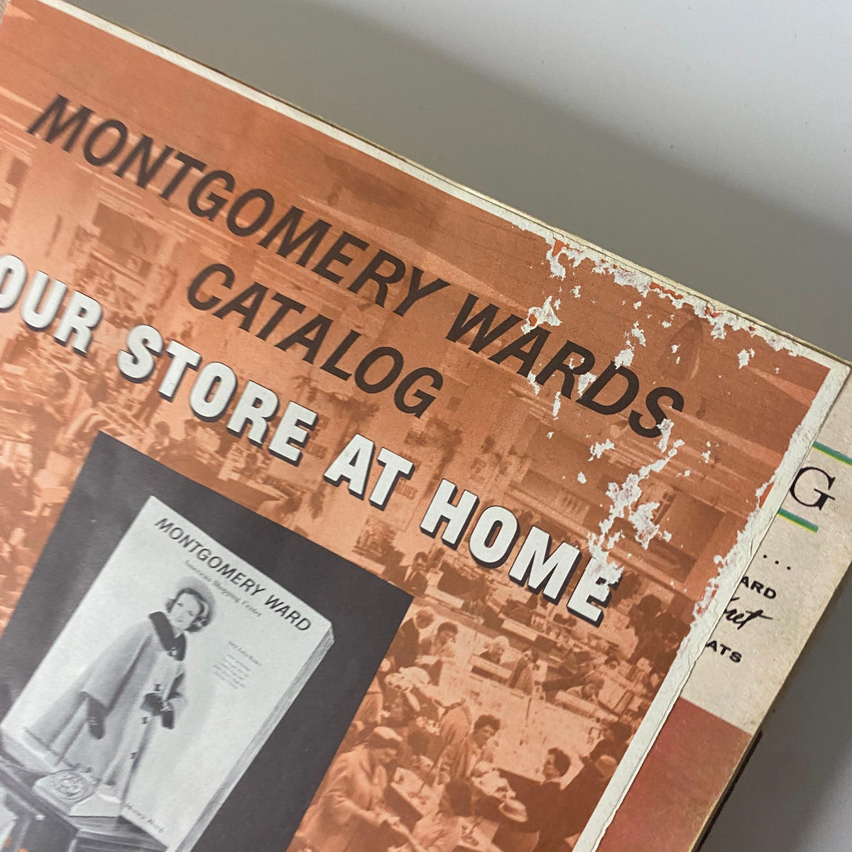Cover page of the 1961 Montgomery Ward Fall and Winter Catalog, featuring the title prominently displayed with a vintage design and marked wear.