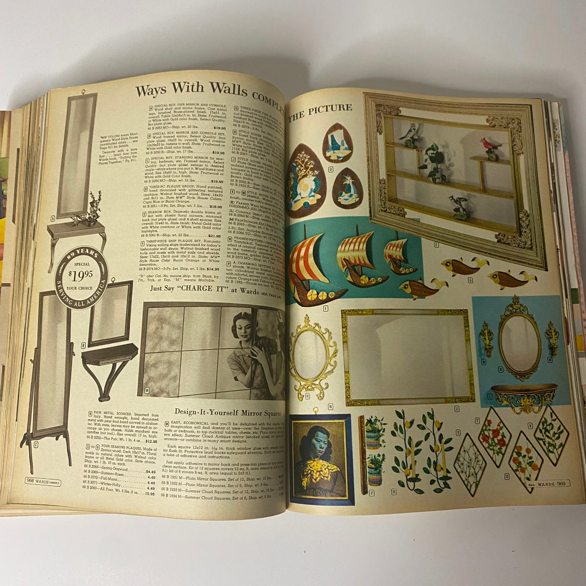 1961 Montgomery Ward Fall and Winter Catalog displaying decorative wall mirrors and artwork, illustrating vintage interior decor styles and options.