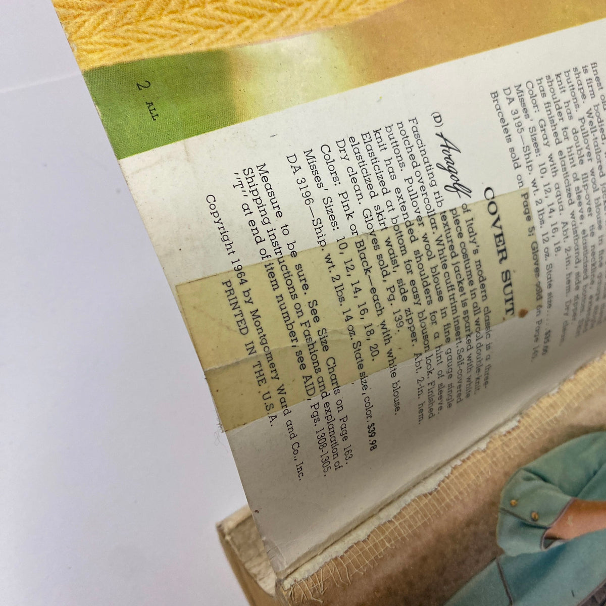 Interior page of the 1964 Montgomery Ward Spring and Summer Catalog showcasing detailed descriptions of the cover suit and fashion measurements.