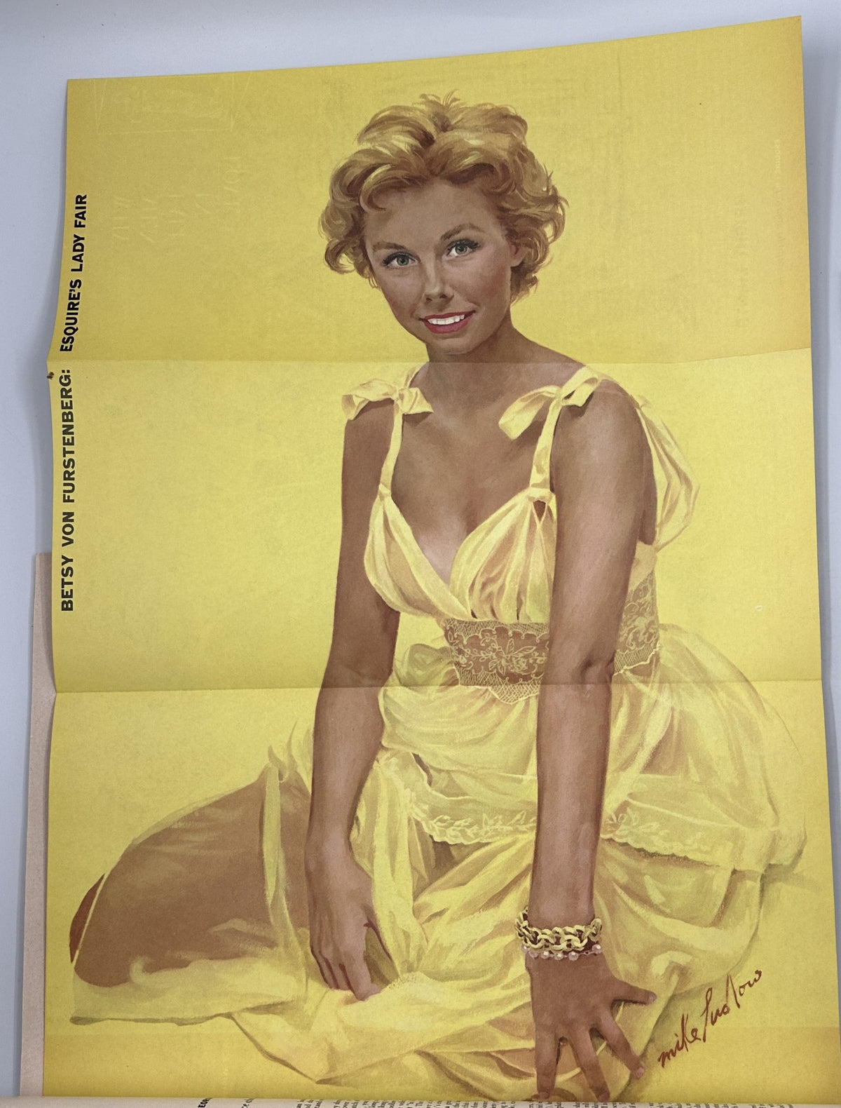 Esquire Magazine March 1955 featuring a foldout illustration of Betsy von Furstenberg in a yellow dress, showcasing vintage pinup art.