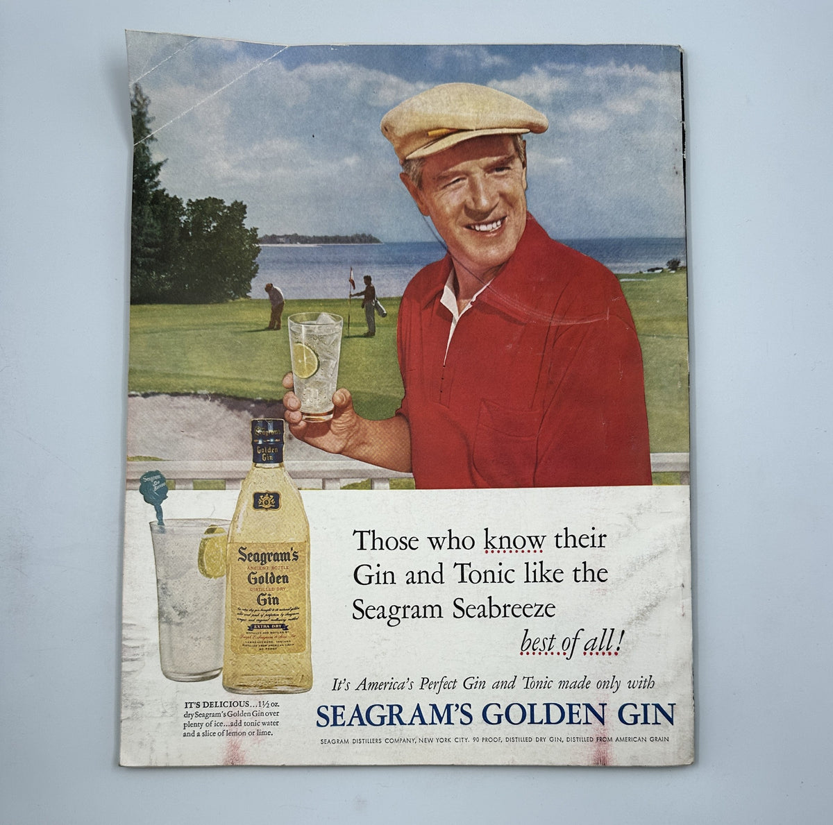 Esquire Magazine July 1955 cover featuring a stylish man holding a drink on a golf course, promoting Seagram's Golden Gin. This vintage issue includes pin-up content with Anita Ekberg.