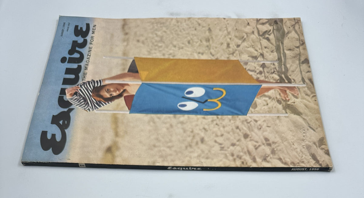 Esquire Magazine August 1956 cover image showcasing a girl in a unique pinup structure, emphasizing a fun beach atmosphere.
