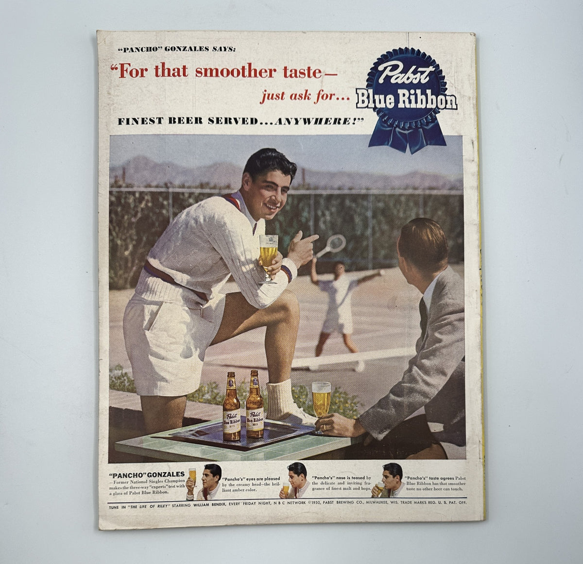 Esquire Magazine July 1950 featuring Ray Bradbury's 'The Illustrated Man' cover, showcasing a vintage advertisement for Pabst Blue Ribbon beer, with a male model enjoying drinks in a leisure setting.