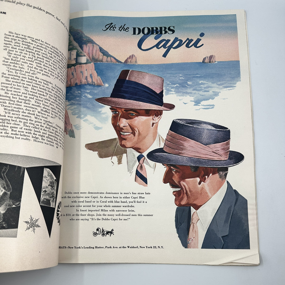 Advertisement page in Esquire Magazine July 1954 featuring stylish Dobbs hats against a scenic seaside background, highlighting fashion for men.