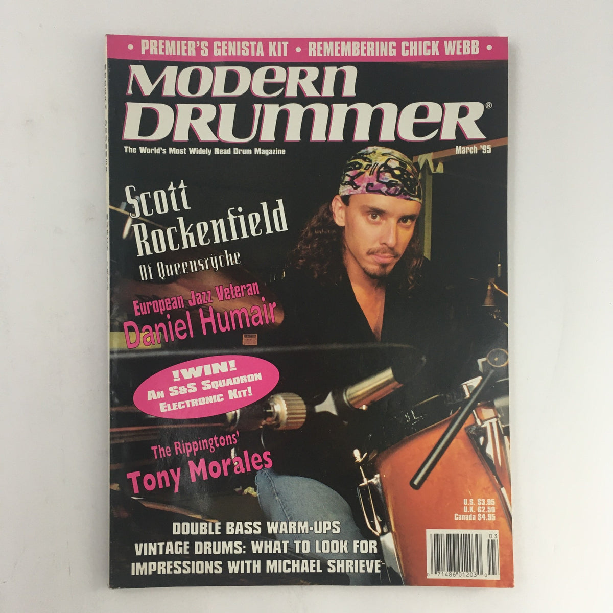 Cover of Modern Drummer Magazine from March 1995 featuring Scott Rockenfield of Queensrÿche, European jazz veteran Daniel Humair, and Tony Morales of The Rippingtons. The magazine highlights drumming techniques, interviews, and features such as double bass warm-ups and tips on vintage drums.