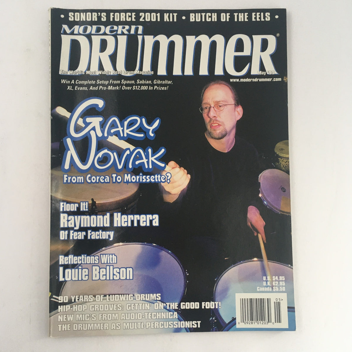 Modern Drummer Magazine May 1999 featuring Gary Novak on the cover, along with highlights on Raymond Herrera and Louie Bellson, showcasing the vibrant world of drumming and musical techniques.