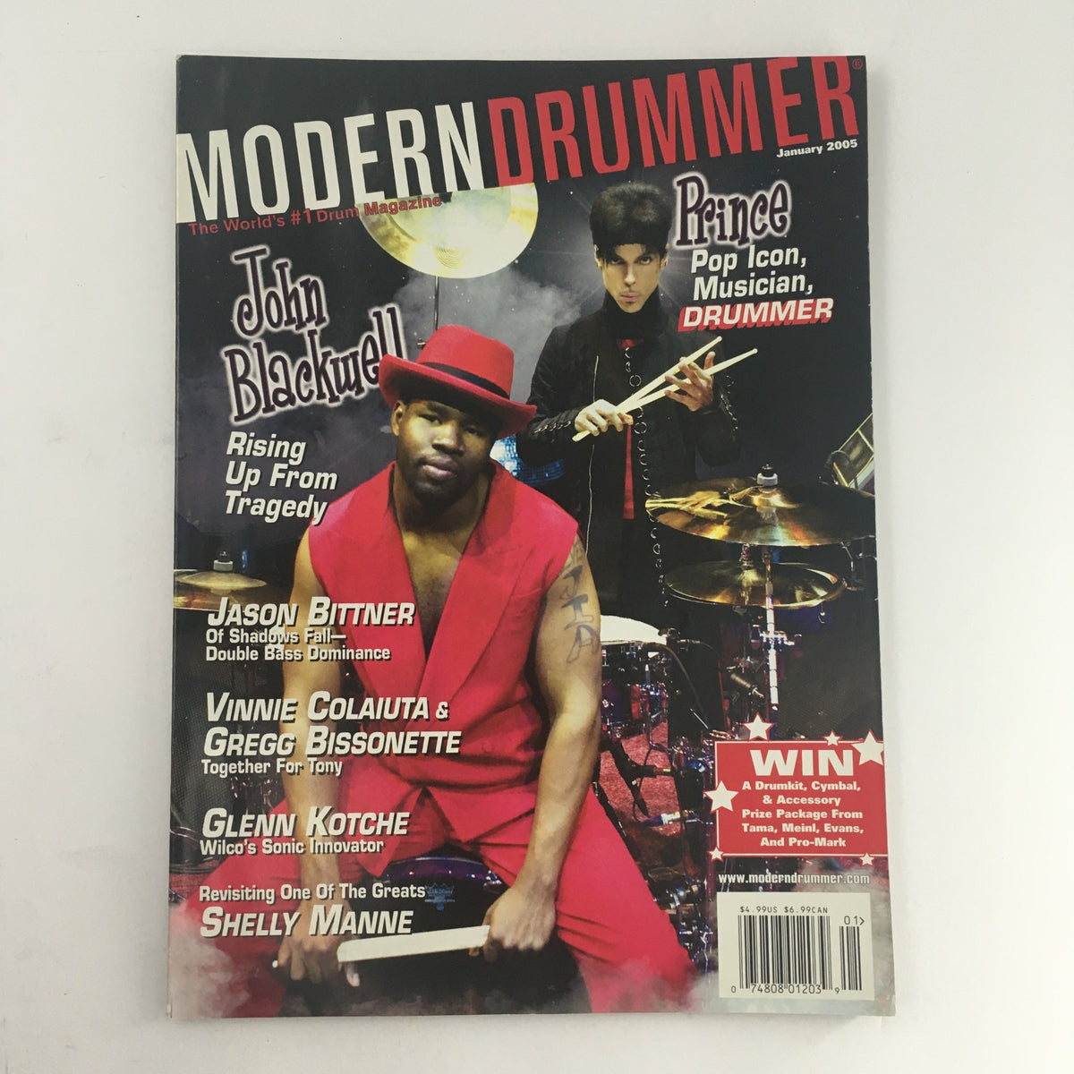 Modern Drummer Magazine January 2005 cover featuring John Blackwell in a red outfit and Prince in a black outfit, highlighting their contributions to music and drumming.