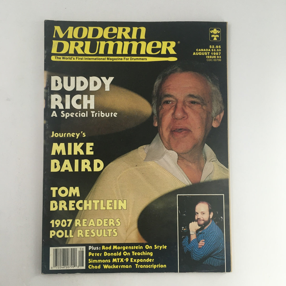 Cover of Modern Drummer Magazine August 1987 featuring a special tribute to Buddy Rich, along with profiles of Journey's Mike Baird and drummer Tom Brechtlein.