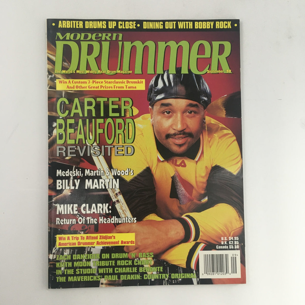 Modern Drummer Magazine September 1998 featuring Carter Beauford, Billy Martin, and Mike Clark on the cover, showcasing drumming insights and techniques.