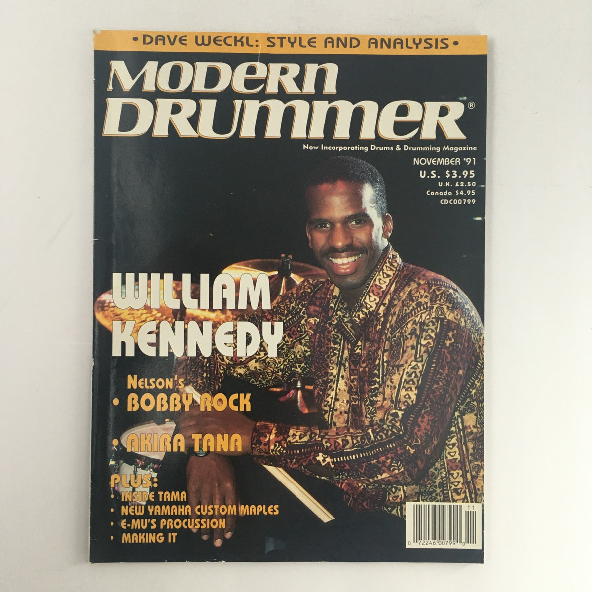 Modern Drummer Magazine November 1991 cover featuring William Kennedy, Bobby Rock, and Akira Tana, showcasing their contributions to the drumming community and highlighting articles inside.