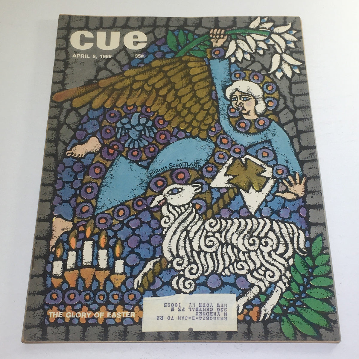 Cue Magazine: April 5, 1969 cover featuring a vibrant theme artwork by Miriam Schottland, depicting Easter imagery including a sheep, flowers, and an angel.