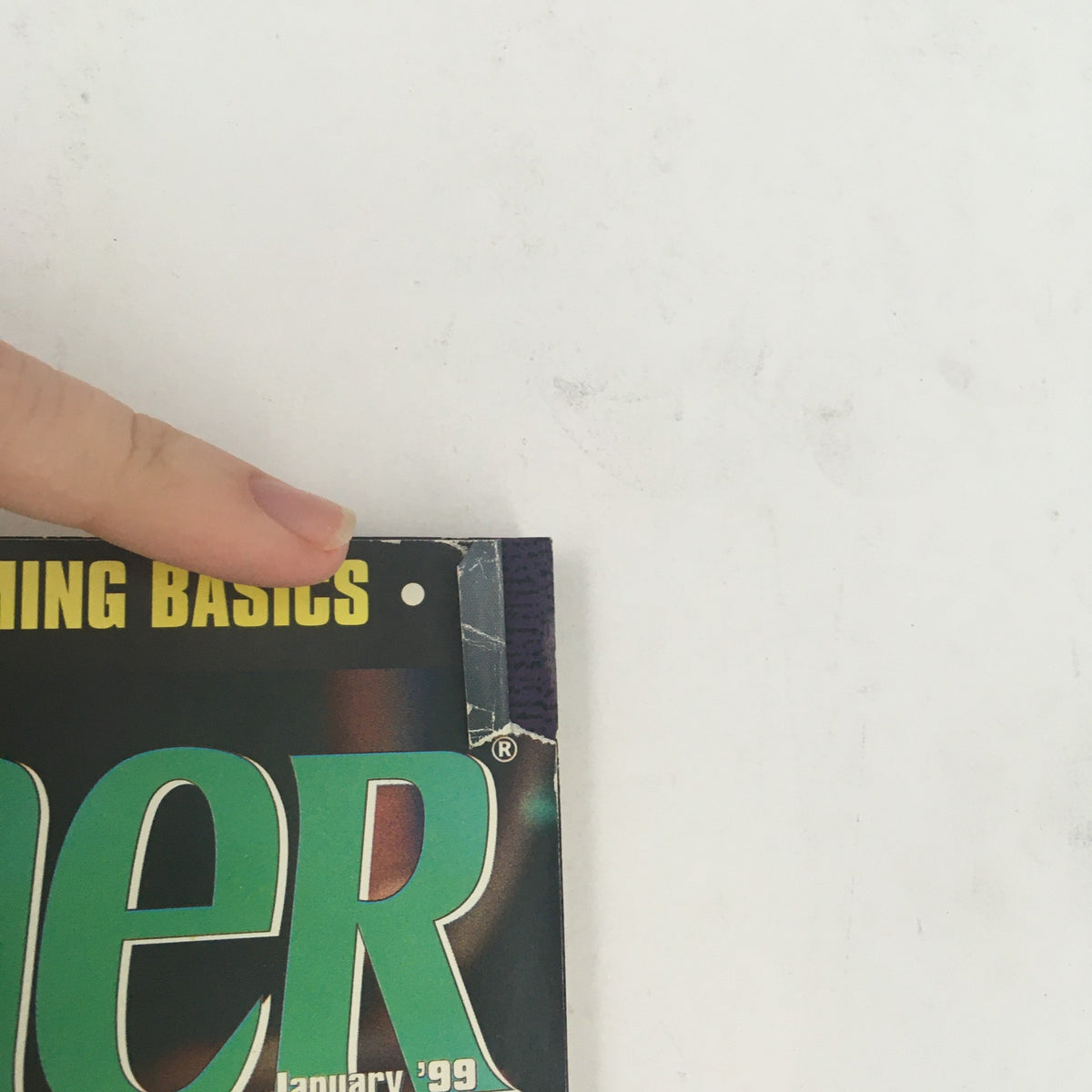 Another view of the Modern Drummer Magazine January 1999, emphasizing the wear on the top edge and the cover text.