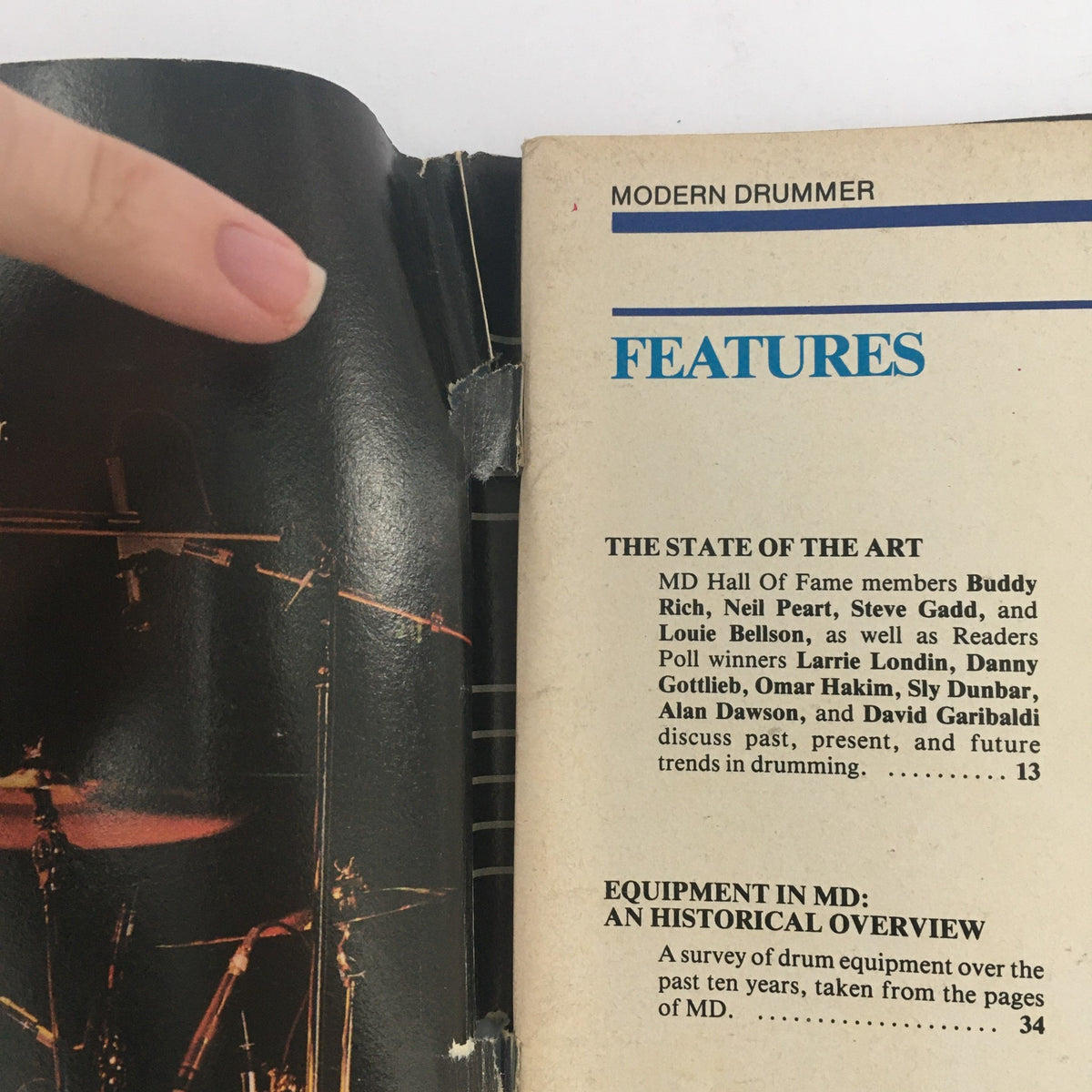 Modern Drummer Magazine January 1986 features page showing articles on legendary drummers Buddy Rich, Neil Peart, and others, highlighting trends in drumming.