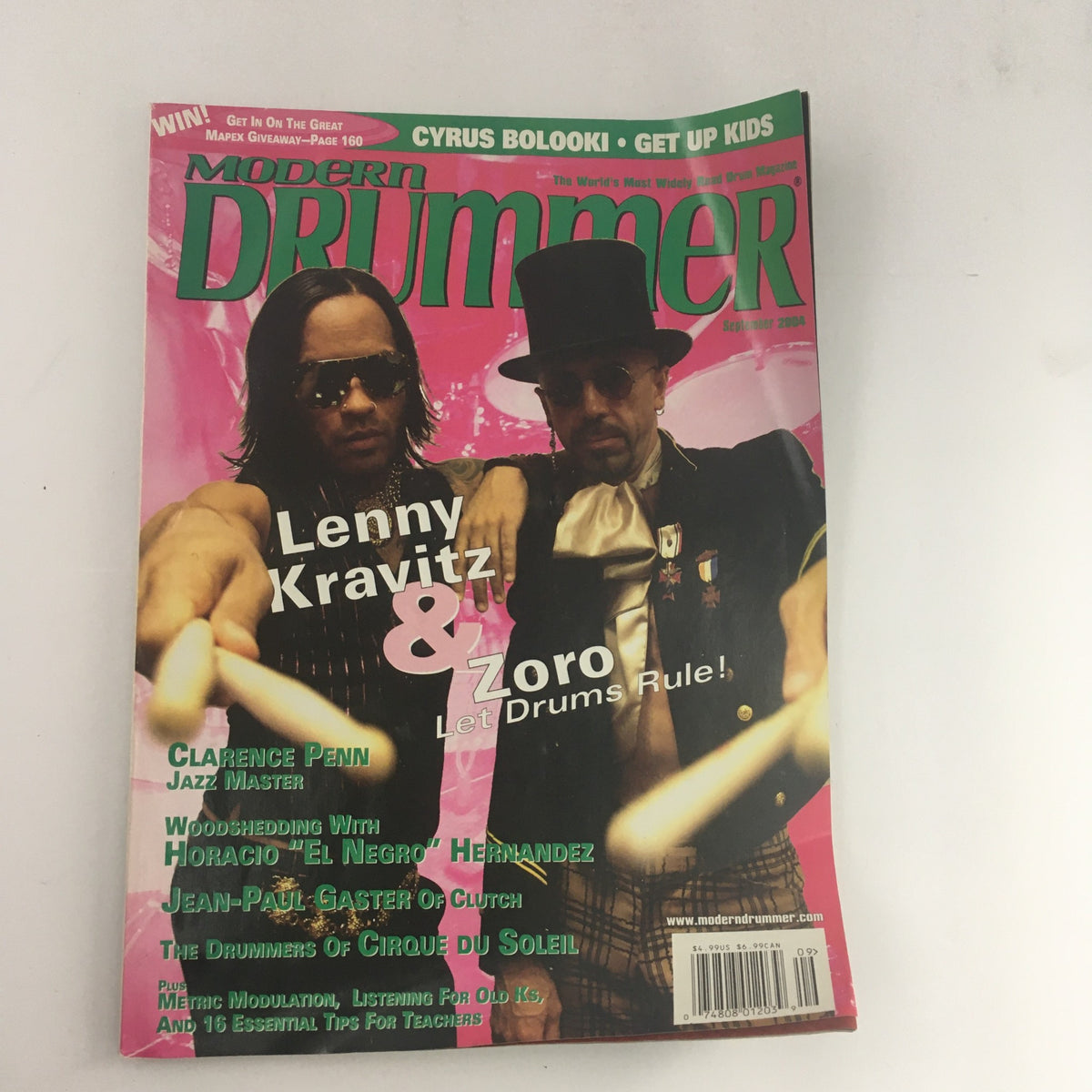 Cover of Modern Drummer Magazine September 2004 featuring Lenny Kravitz and Zoro, with the tagline 'Let Drums Rule!' highlighting drumming insights.