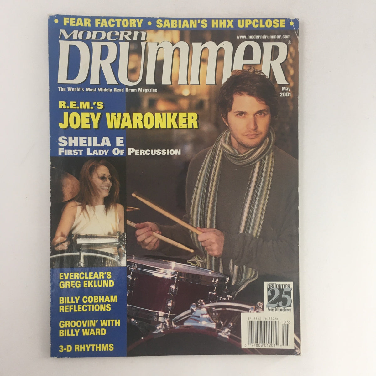 Cover of Modern Drummer Magazine May 2001 featuring musicians Joey Waronker, Sheila E., and Greg Eklund. Highlights include drumming techniques and insights from industry professionals.