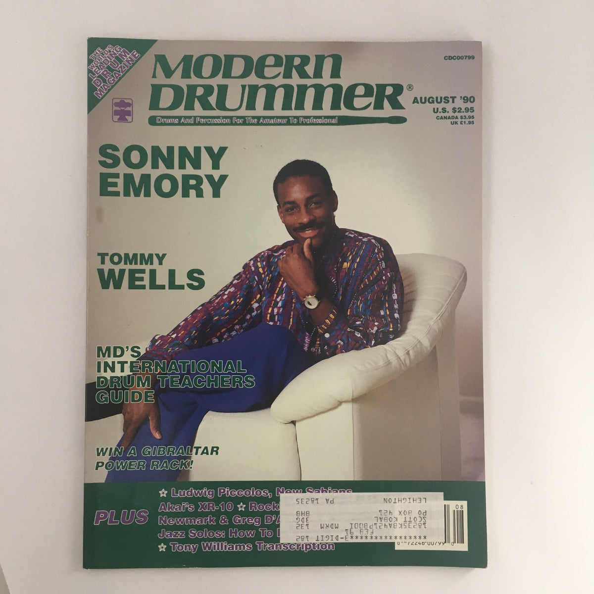 Cover of Modern Drummer Magazine August 1990 featuring Sonny Emory and Tommy Wells, showcasing insights on drumming and Ludwig Piccolo drums.