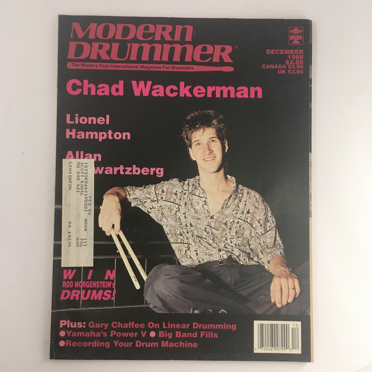 Modern Drummer Magazine from December 1988 featuring Chad Wackerman on the cover, alongside Lionel Hampton and Allan Schwartzberg, showcasing its vibrant design and promotional content for drummers.