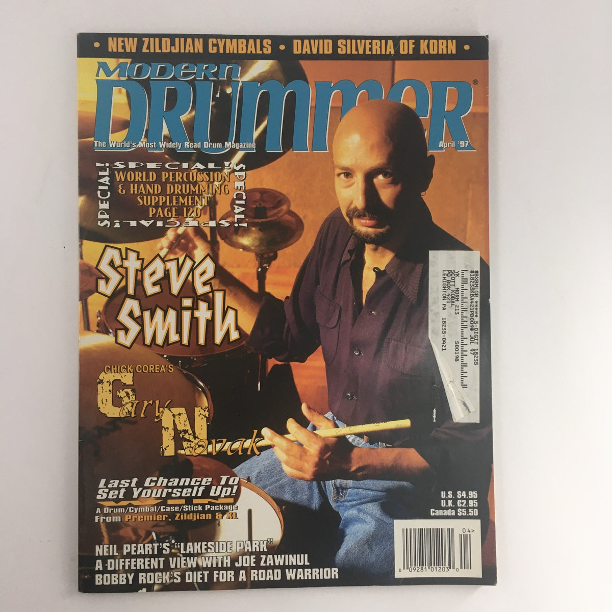 Cover of Modern Drummer Magazine, April 1997 featuring Steve Smith, with additional highlights on Gary Novak and Neil Peart, perfect for vintage magazine collectors.