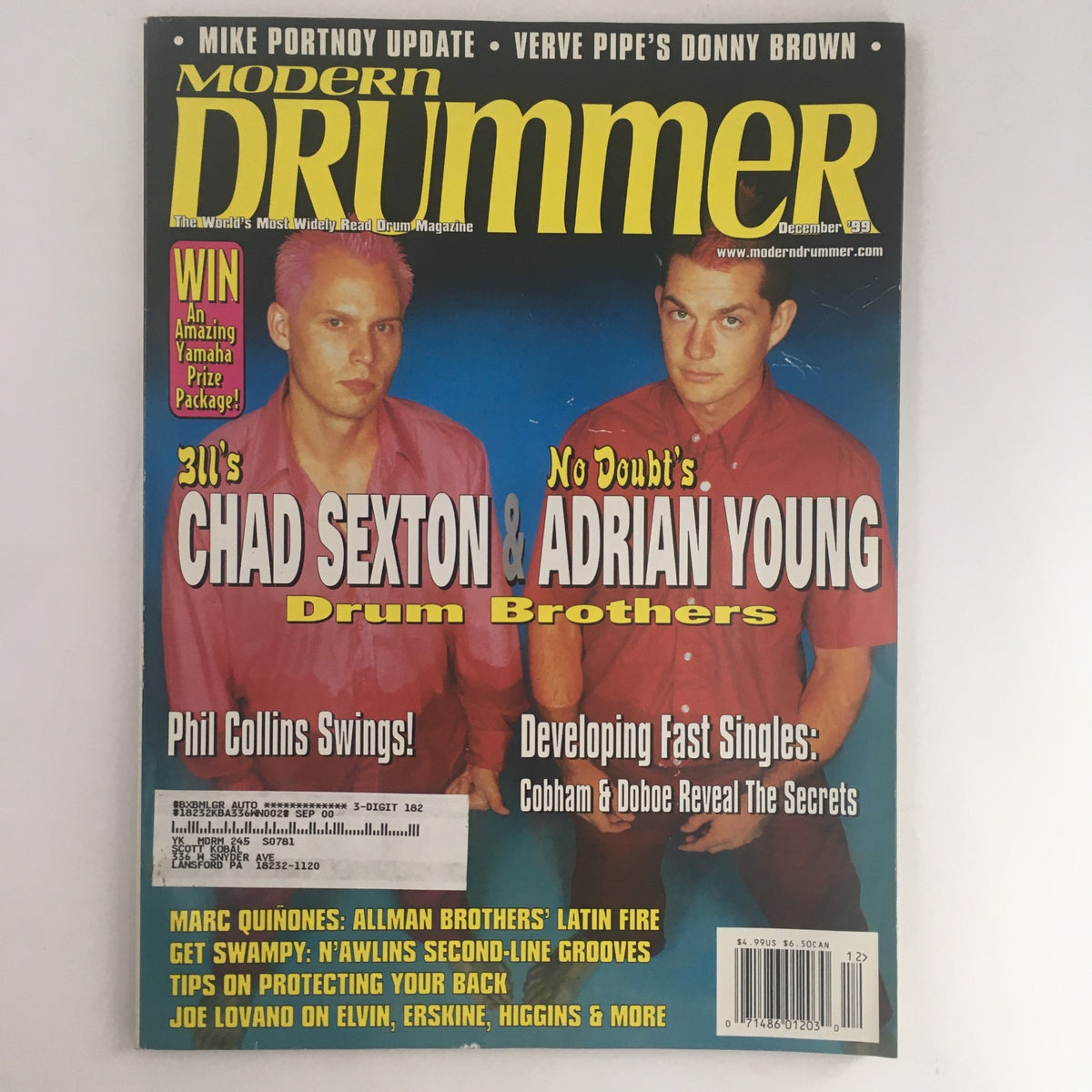 Cover of Modern Drummer Magazine, December 1999, featuring Chad Sexton and Adrian Young, who are highlighted as 'Drum Brothers'.