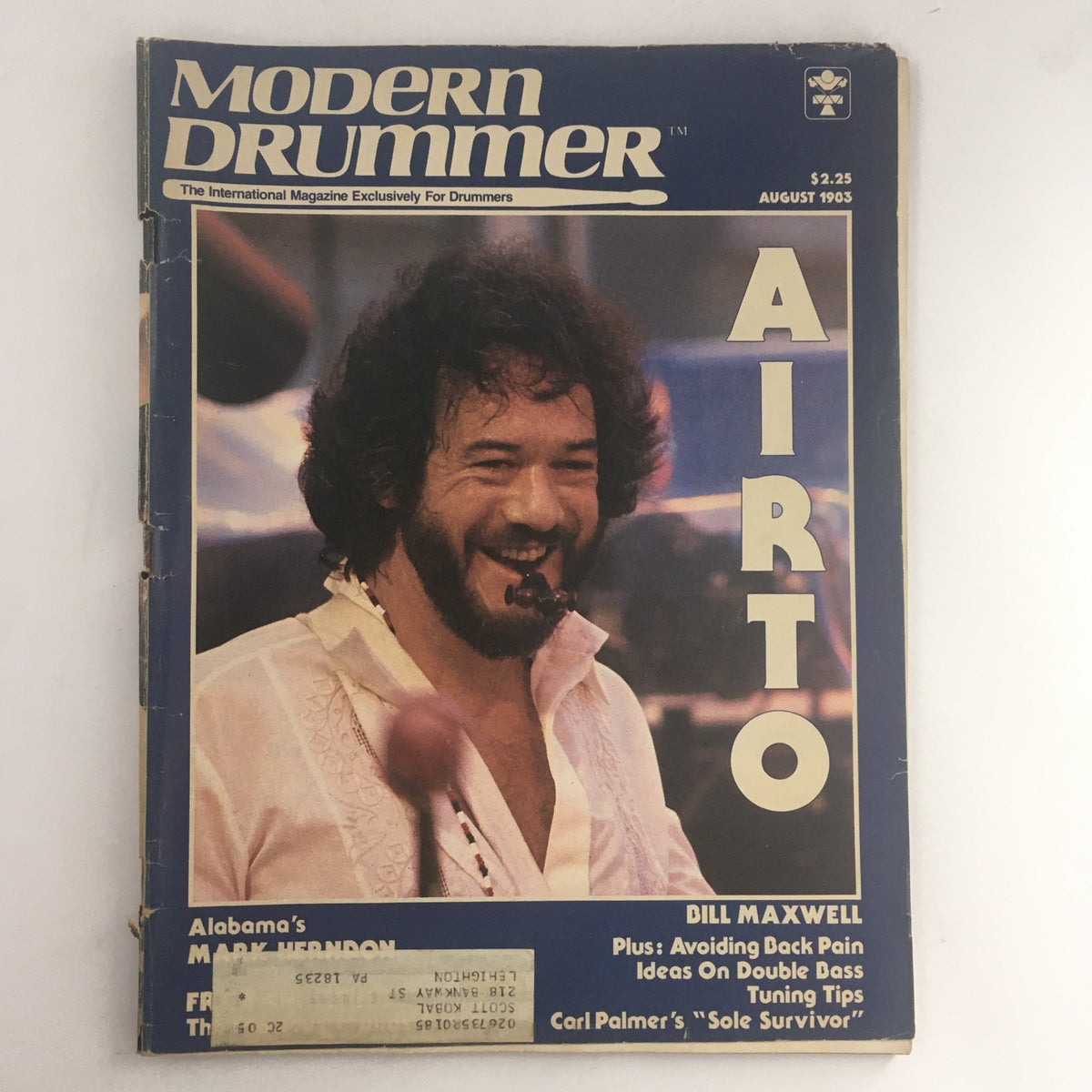 Cover of Modern Drummer Magazine August 1983 featuring Airto Moreira with a smile, showcasing insights into drumming from iconic musicians.