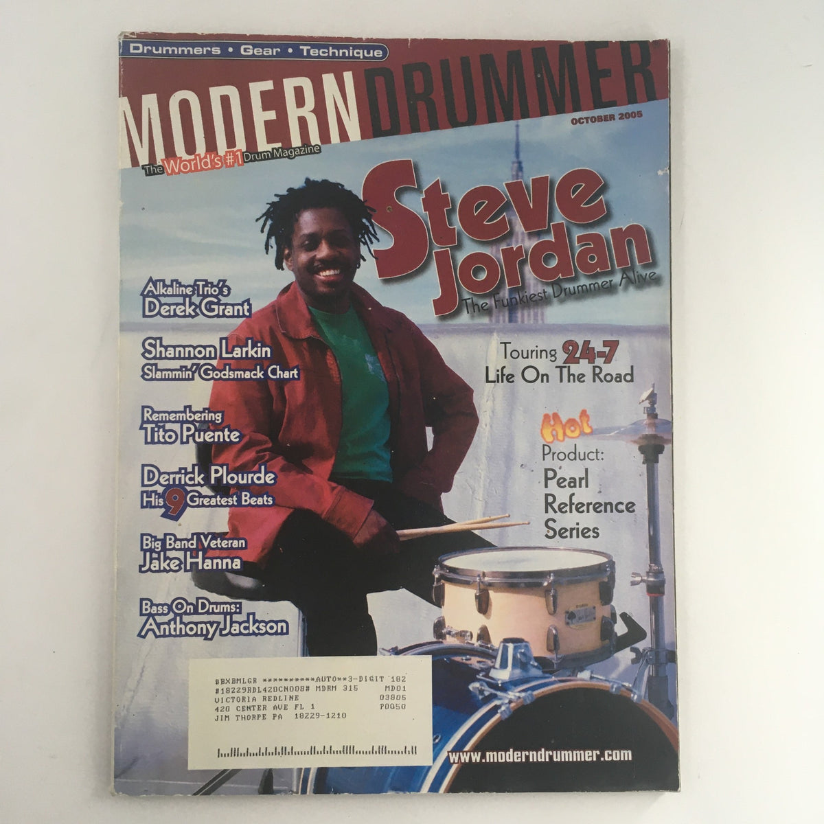 Cover of Modern Drummer Magazine, October 2005 featuring Steve Jordan, showcasing his vibrant portrait and drumming spirit along with promotional content for drumming gear and techniques.