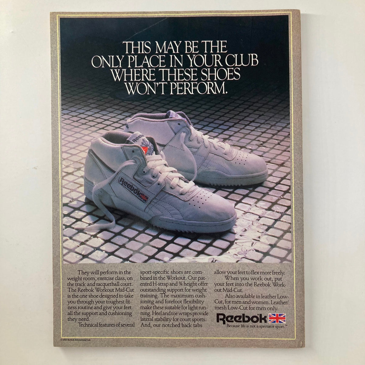 Advertisement page from Joe Weider's Muscle & Fitness Magazine May 1986, showcasing Reebok Workout Mid-Cut shoes designed for fitness activities.