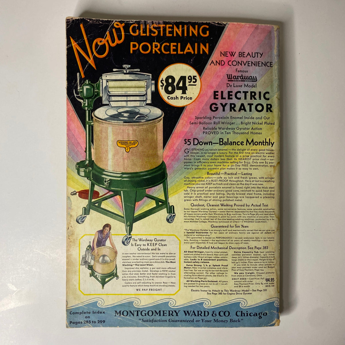 Cover page of 1930 Montgomery Ward Spring and Summer Catalog No. 112 featuring an advertisement for the Electric Gyrator washing machine, showcasing vibrant colors and vintage design elements.