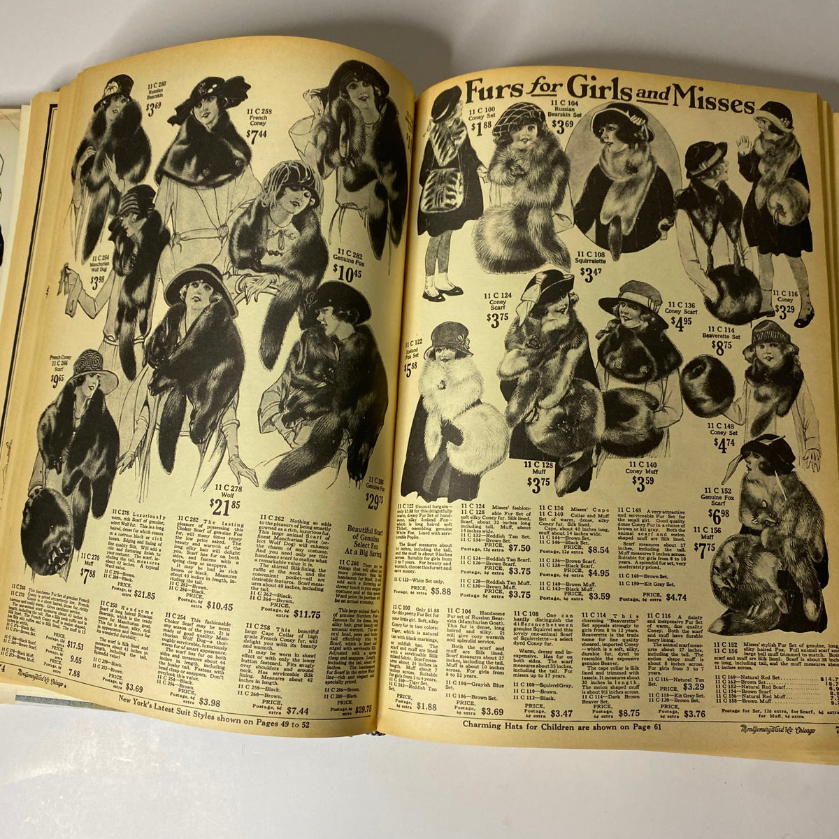 Furs for girls and misses featured in the 1922-1923 Montgomery Ward Fall and Winter Catalog No. 97, displaying luxurious fur options and pricing.