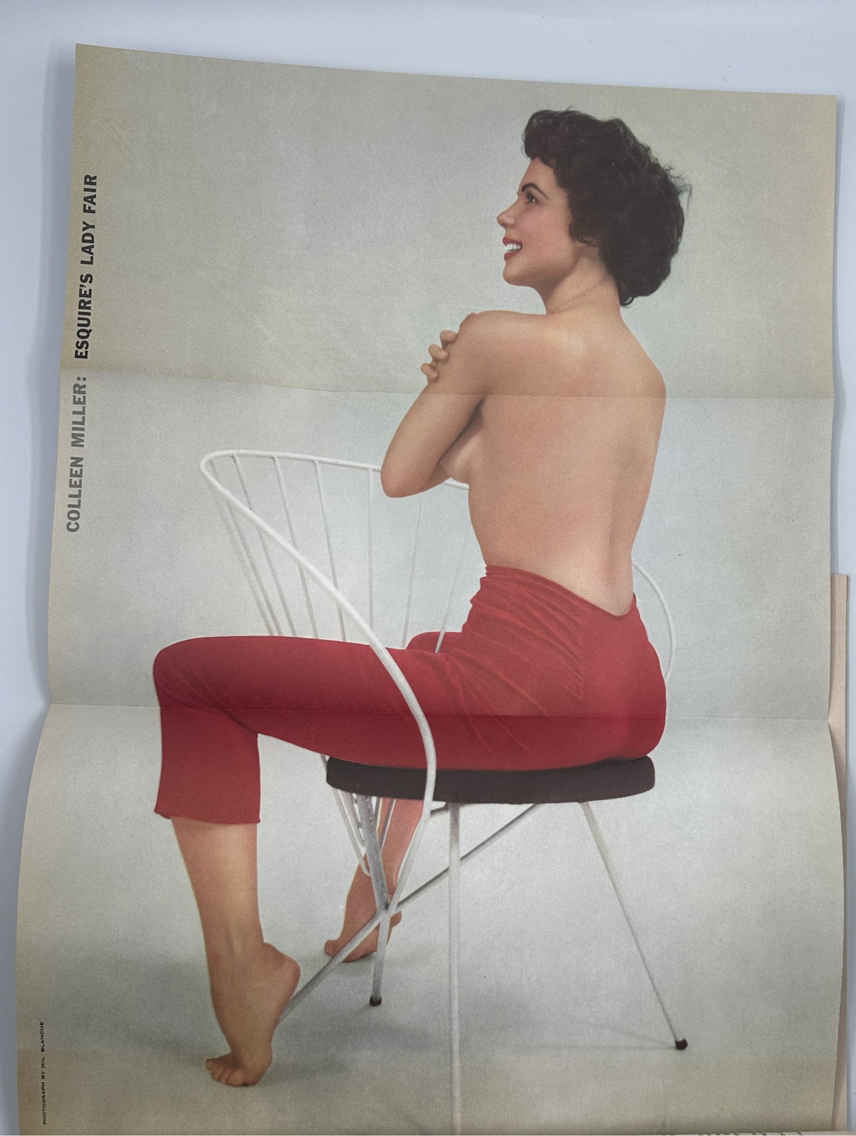 Colleen Miller featured in Esquire Magazine October 1956 posing artistically without a top, showcasing a vintage aesthetic.