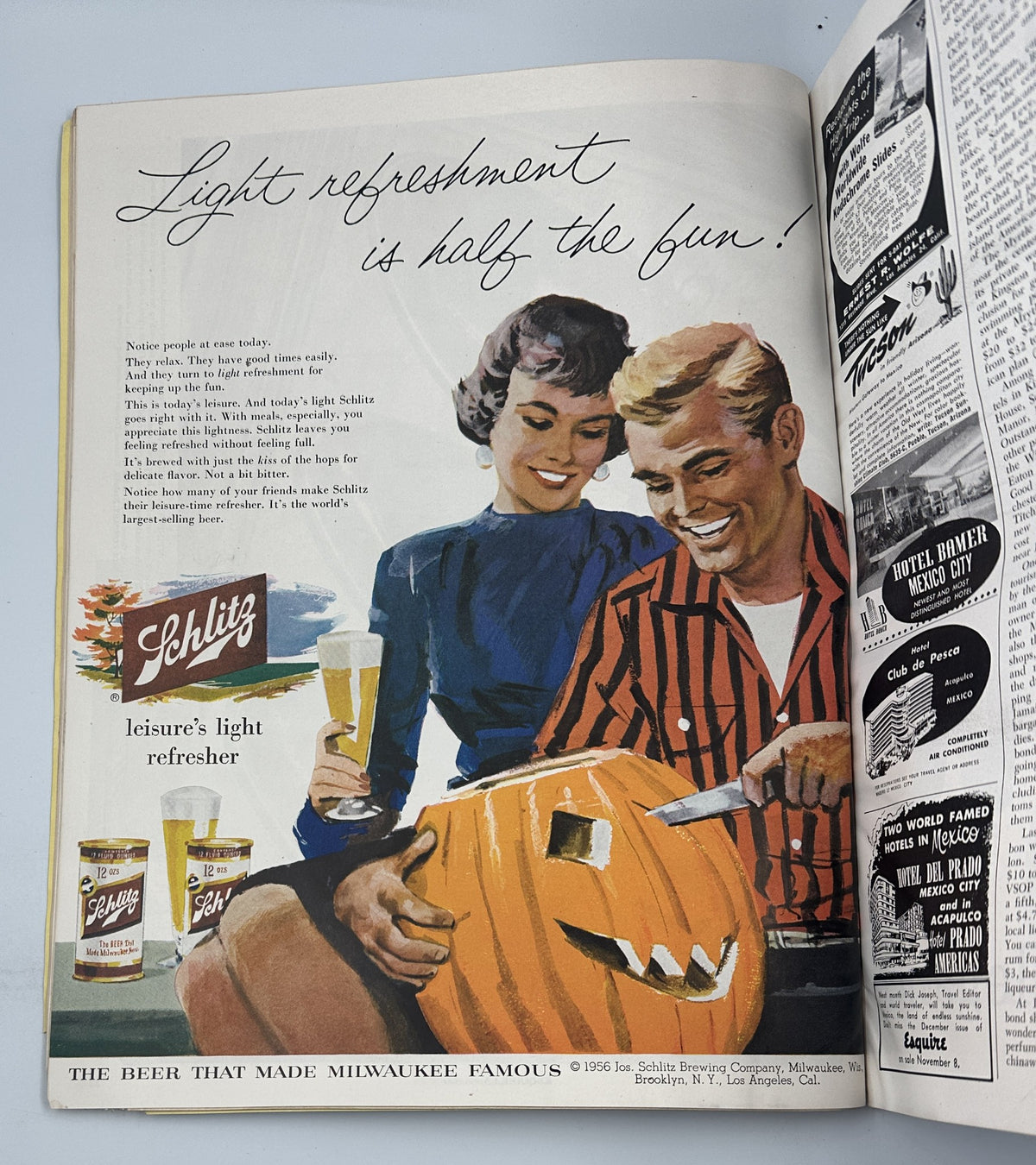 Vintage advertisement in Esquire Magazine November 1956 featuring a couple enjoying Schlitz beer while carving a pumpkin, emphasizing leisure and fun.
