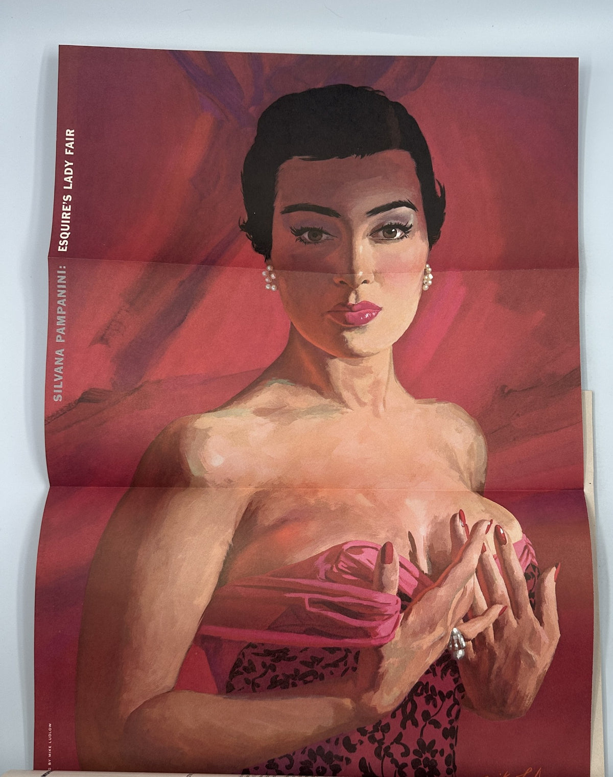 Foldout pinup of Silvana Pampanini from Esquire Magazine June 1956, displayed in vibrant colors and elegant attire.