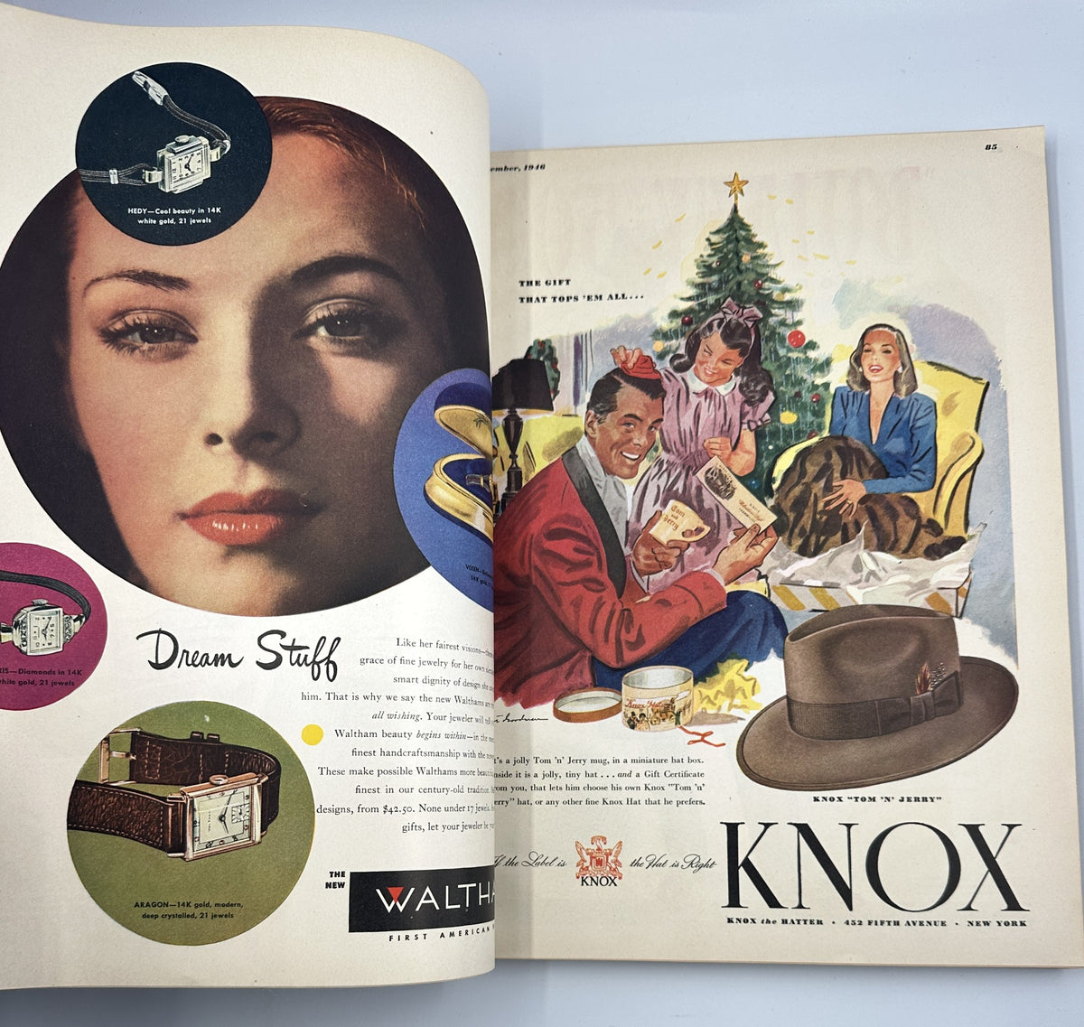 Esquire Magazine December 1946 Christmas Annual Holiday Issue featuring an advertisement with a woman adorned with jewelry beside a Christmas tree.