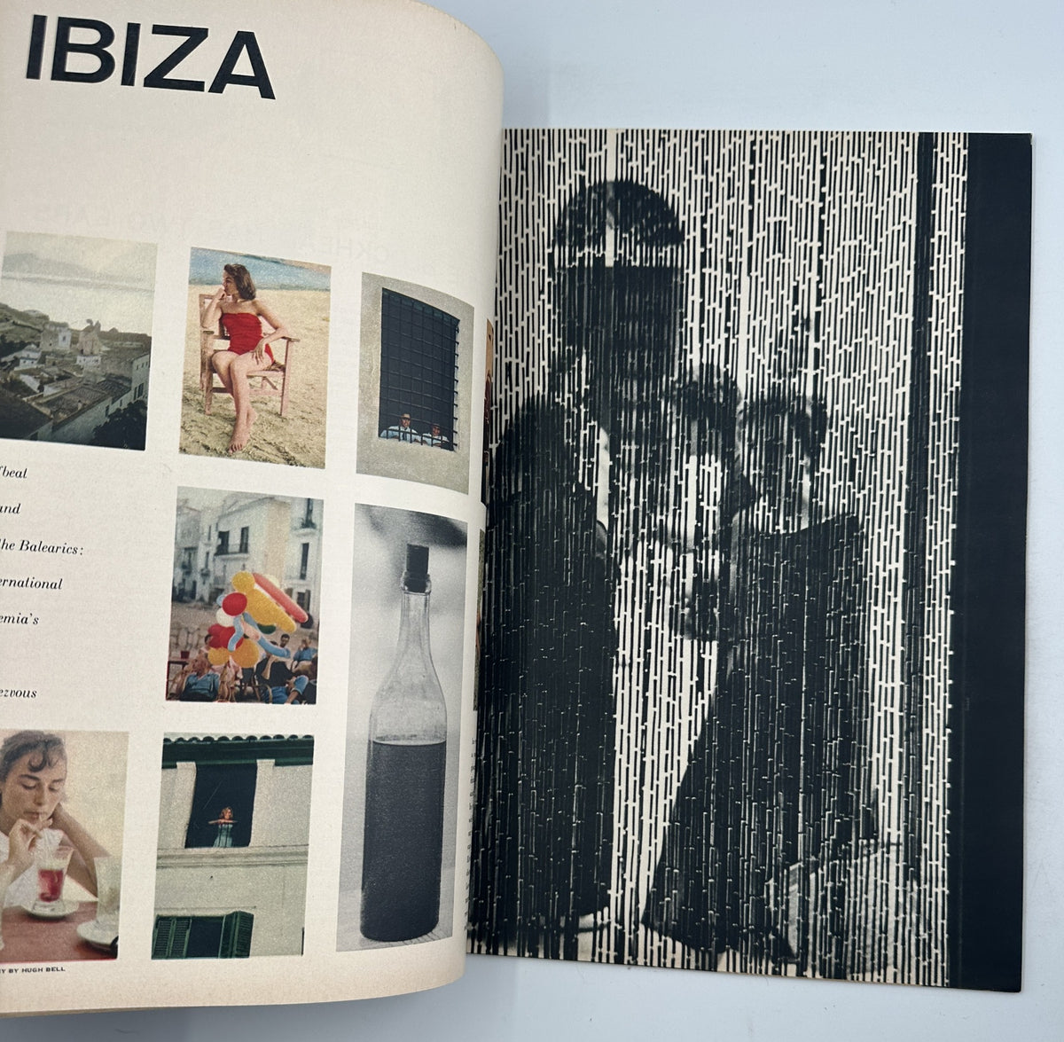 Page featuring Ibiza photographs and features from Esquire Magazine April 1957, highlighting the beauty of the Balearic Islands.